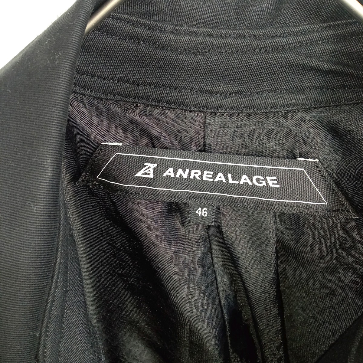ANREALAGE のブランドタグとサイズ46表記